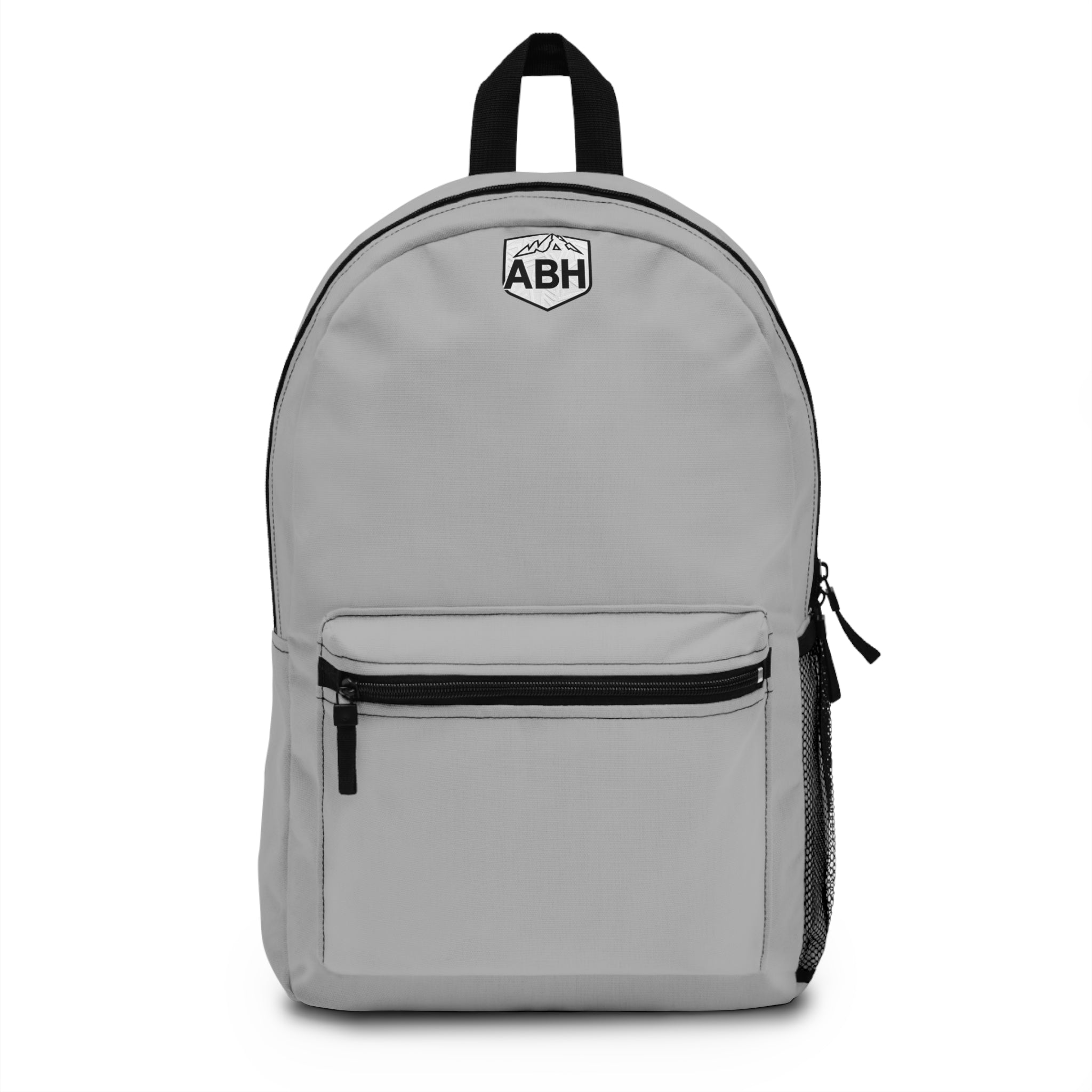 Light gray daypack with black trim, a front zip pocket, side mesh pocket, and small ABH mountain badge